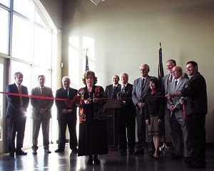 Johnson County Commission Chair Annabeth Surbaugh cut the ribbon Thursday marking the official opening of the new Division of Motor Vehicles office in Olathe. Although the office opened in August, the county wanted to recognize the occasion with an official ceremony and open house that was attended by county, city and state officials. 